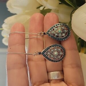 Navajo type dangly larimar Stone earrings with a tint of a turquoise green